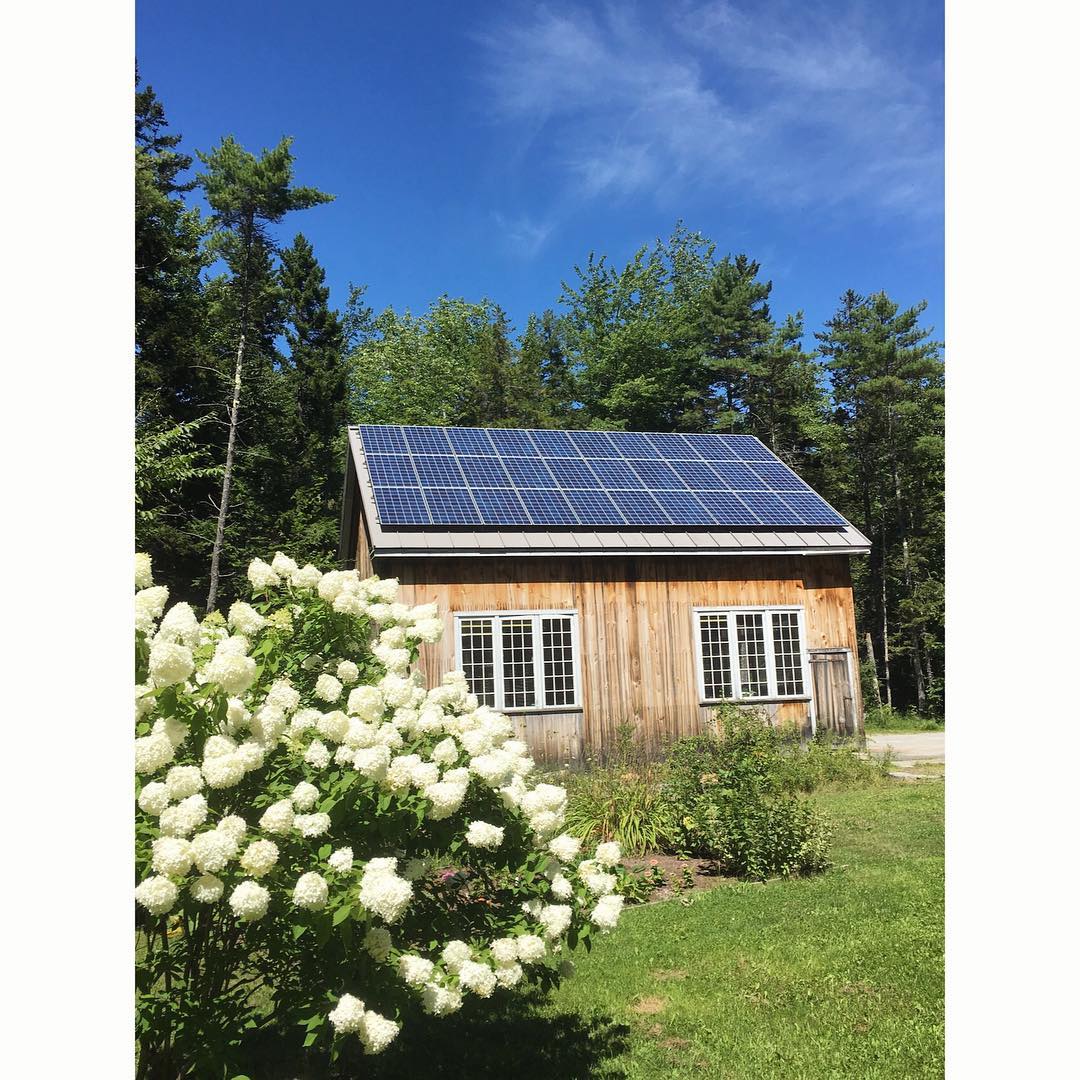 Solar panels on top of a barn in Maine